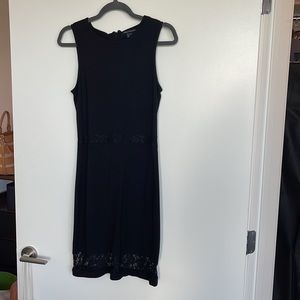 Black dress with lace in center and bottom of dress, size 6